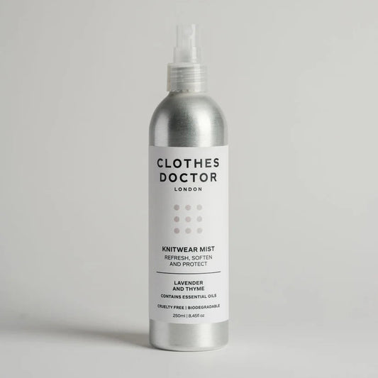 Silver aluminium bottle of Clothes Doctor Knitwear Mist on a light grey background