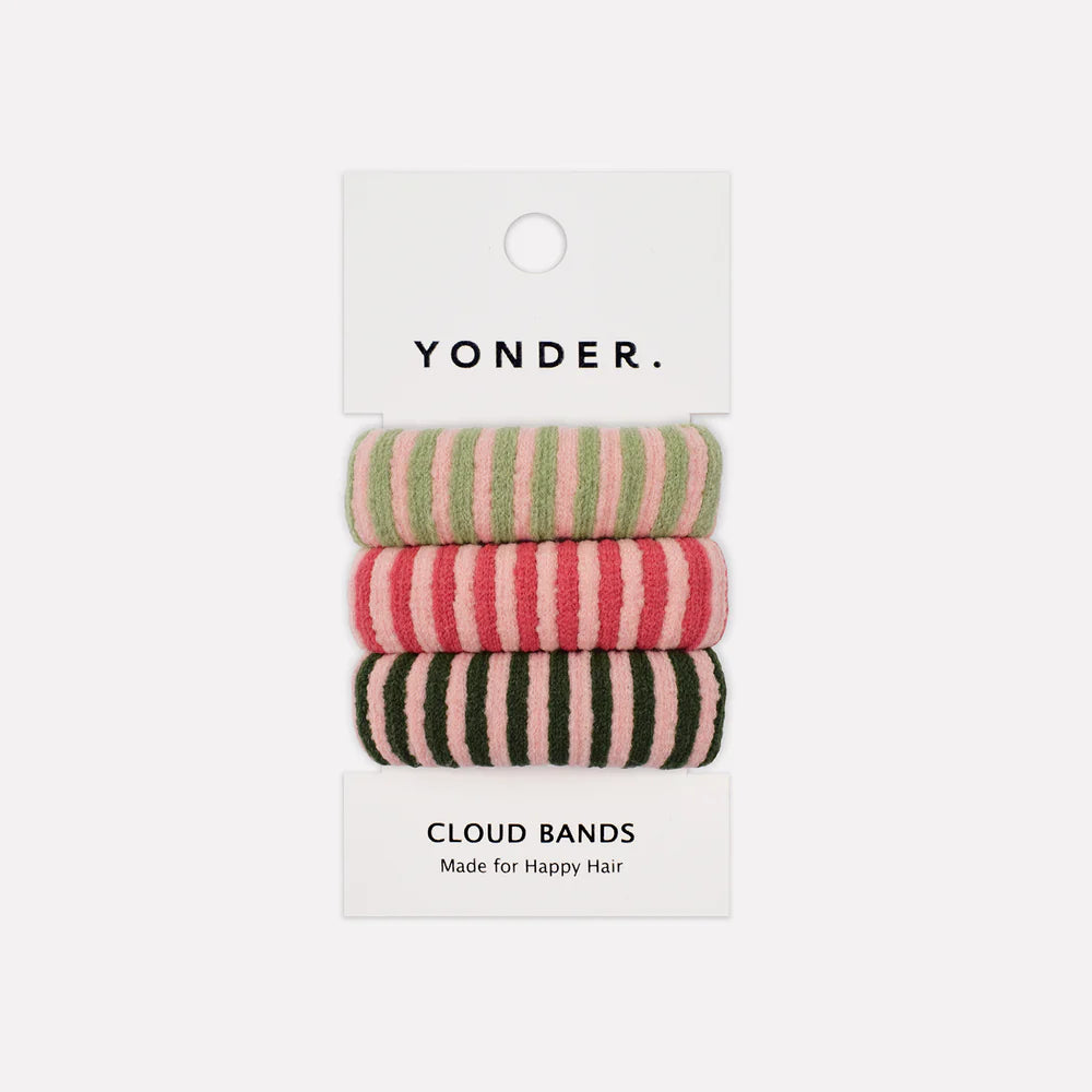 Three pink and green striped hair bands on a Yonder branded card with a white background