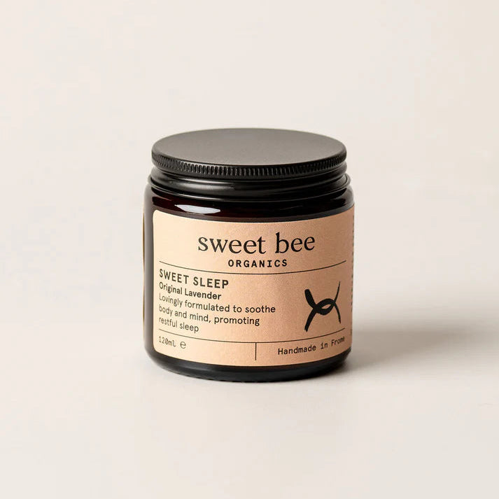Glass jar with beige label saying Sweet Bee Organics Sweet Sleep