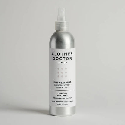 Silver aluminium bottle of Clothes Doctor Knitwear Mist on a light grey background