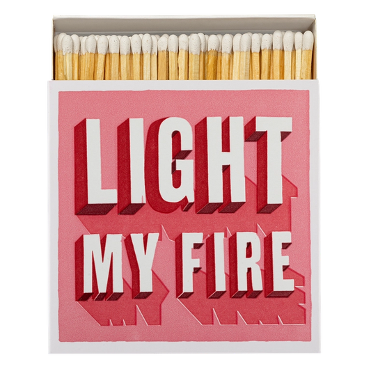 Archivist signature square matchbox featuring the words 'Light My Fire' in bold white and dark pink font on a light pink background.
