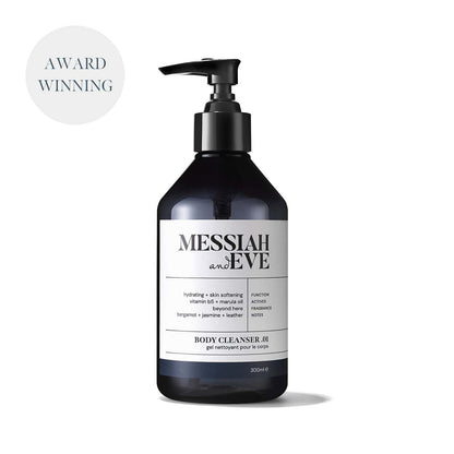 Bottle of shower gel with pump action dispenser and a white label saying 'Messiah and Eve Body Cleanser .01'