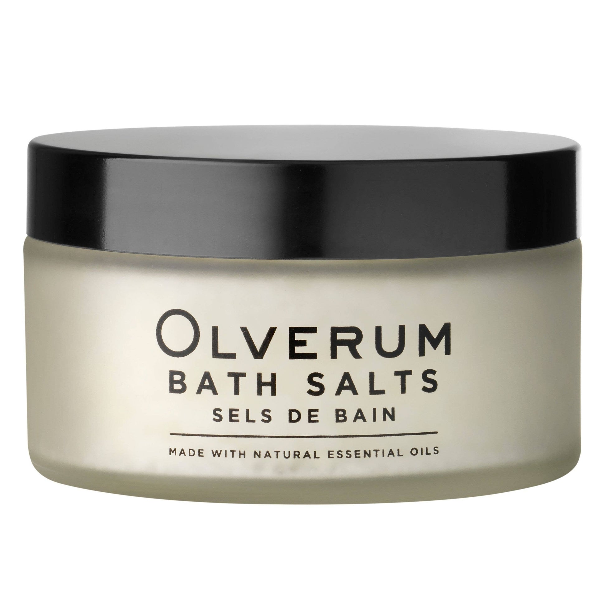 Jar of Olverum bath salts with a black lid on a white background