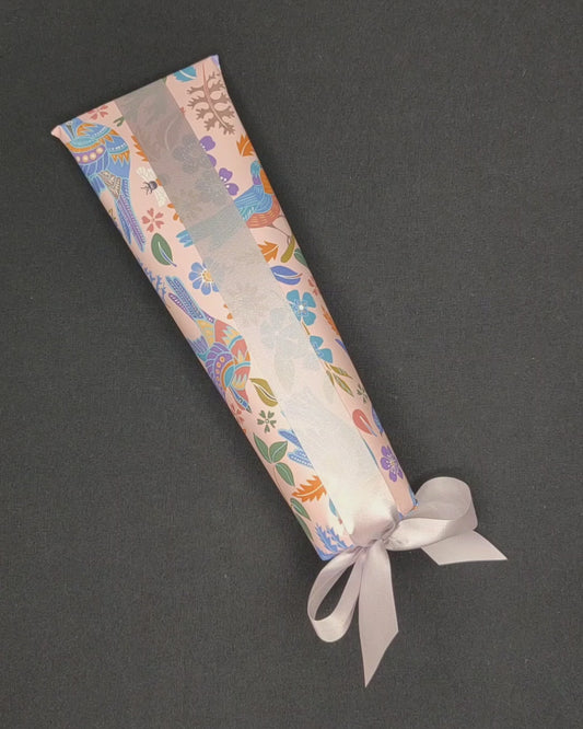 Video footage of a tube of Silky Skin Scrub being unwrapped